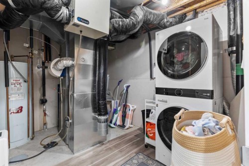 219 Silverado Plains Close Sw, Calgary, AB - Indoor Photo Showing Laundry Room