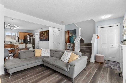 219 Silverado Plains Close Sw, Calgary, AB - Indoor Photo Showing Living Room