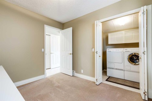 88 Bermondsey Way Nw, Calgary, AB - Indoor Photo Showing Laundry Room