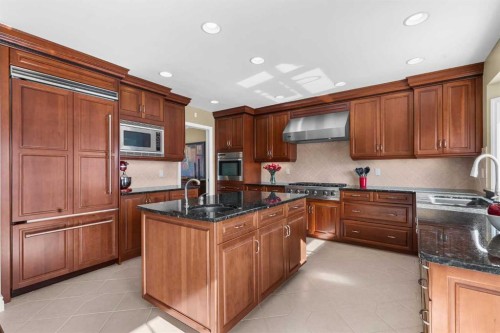 88 Bermondsey Way Nw, Calgary, AB - Indoor Photo Showing Kitchen With Double Sink