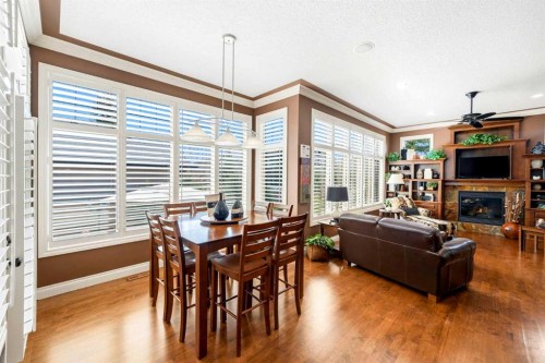 21 Evergreen Row Sw, Calgary, AB - Indoor With Fireplace