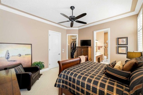 21 Evergreen Row Sw, Calgary, AB - Indoor Photo Showing Bedroom