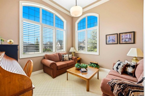 21 Evergreen Row Sw, Calgary, AB - Indoor Photo Showing Living Room