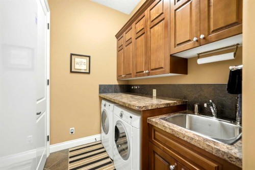 21 Evergreen Row Sw, Calgary, AB - Indoor Photo Showing Laundry Room