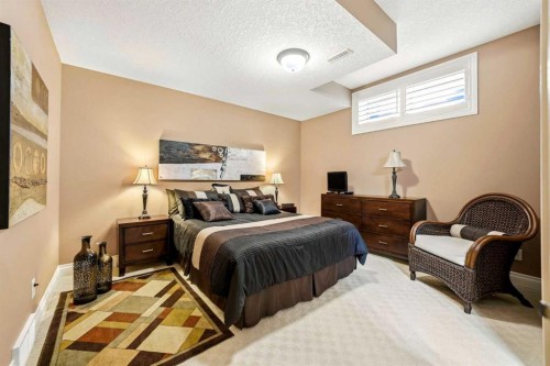 21 Evergreen Row Sw, Calgary, AB - Indoor Photo Showing Bedroom