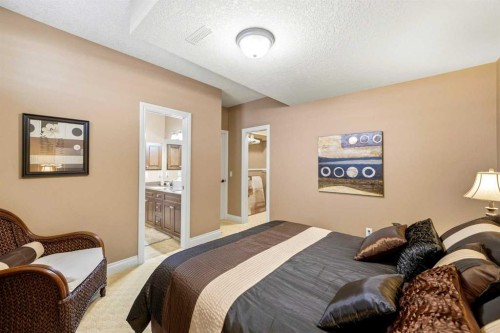 21 Evergreen Row Sw, Calgary, AB - Indoor Photo Showing Bedroom
