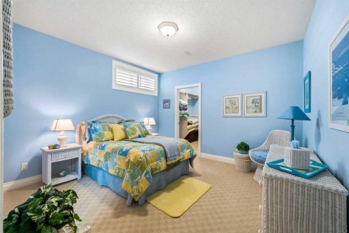 21 Evergreen Row Sw, Calgary, AB - Indoor Photo Showing Bedroom