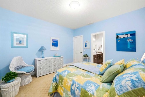 21 Evergreen Row Sw, Calgary, AB - Indoor Photo Showing Bedroom