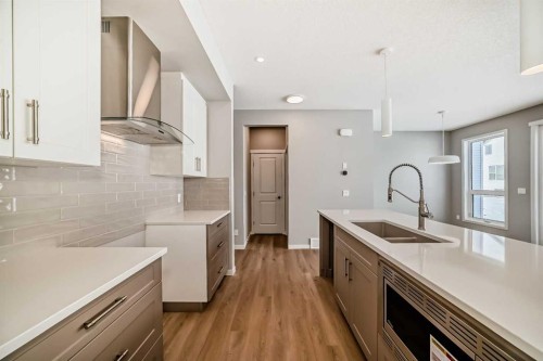 53 Bartlett Way Se, Calgary, AB - Indoor Photo Showing Kitchen With Double Sink With Upgraded Kitchen