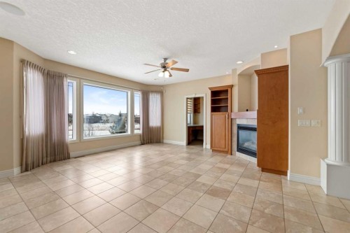 28 Panatella Manor Nw, Calgary, AB - Indoor With Fireplace