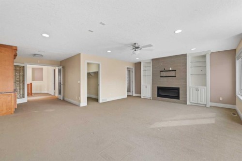 28 Panatella Manor Nw, Calgary, AB - Indoor With Fireplace
