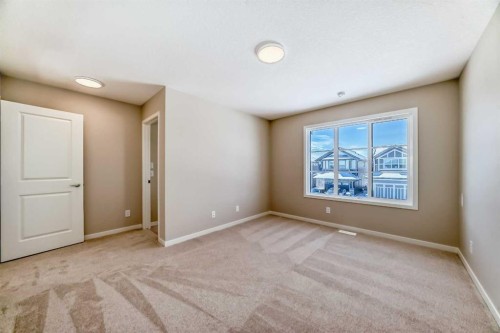 185 Mercado Landing Se, Calgary, AB - Indoor Photo Showing Other Room