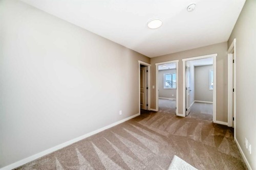 185 Mercado Landing Se, Calgary, AB - Indoor Photo Showing Other Room
