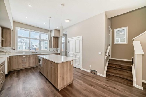 833 Marine Drive Se, Calgary, AB - Indoor Photo Showing Kitchen With Double Sink With Upgraded Kitchen