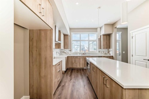 833 Marine Drive Se, Calgary, AB - Indoor Photo Showing Kitchen With Double Sink