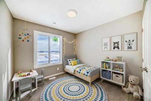 833 Marine Drive Se, Calgary, AB - Indoor Photo Showing Bedroom