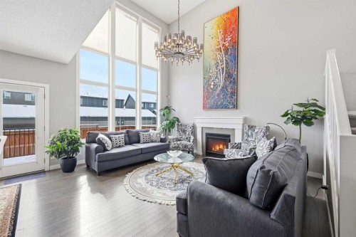 127 Walden Heights Se, Calgary, AB - Indoor Photo Showing Living Room With Fireplace