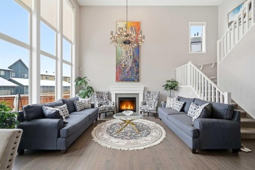 127 Walden Heights Se, Calgary, AB - Indoor Photo Showing Living Room With Fireplace