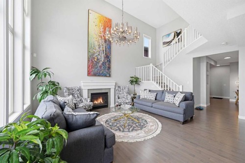 127 Walden Heights Se, Calgary, AB - Indoor Photo Showing Living Room With Fireplace