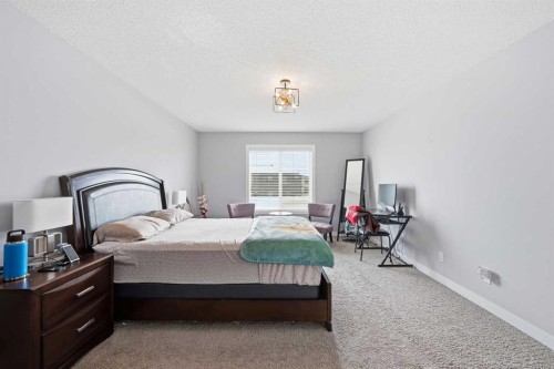 127 Walden Heights Se, Calgary, AB - Indoor Photo Showing Bedroom