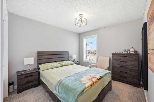 127 Walden Heights Se, Calgary, AB - Indoor Photo Showing Bedroom