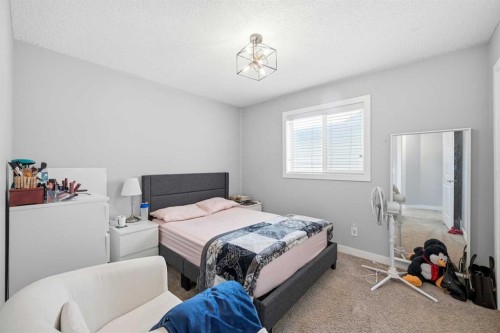 127 Walden Heights Se, Calgary, AB - Indoor Photo Showing Bedroom