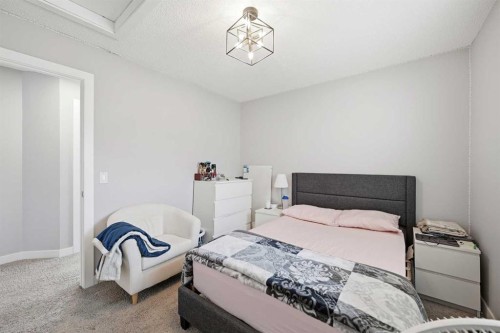 127 Walden Heights Se, Calgary, AB - Indoor Photo Showing Bedroom