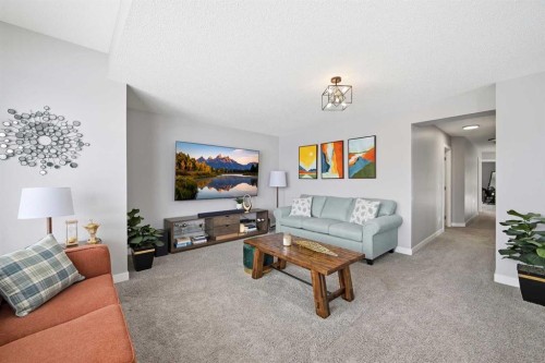 127 Walden Heights Se, Calgary, AB - Indoor Photo Showing Living Room