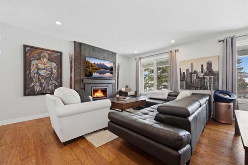1015 Maplecroft Road Se, Calgary, AB - Indoor Photo Showing Living Room With Fireplace