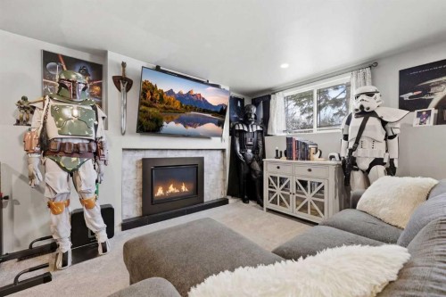 1015 Maplecroft Road Se, Calgary, AB - Indoor Photo Showing Living Room With Fireplace