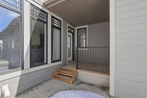 74 Alpine Gardens Sw, Calgary, AB - Outdoor With Deck Patio Veranda With Exterior