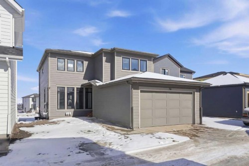 74 Alpine Gardens Sw, Calgary, AB - Outdoor