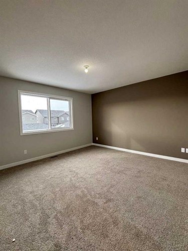 941 Reynolds Lane, Airdrie, AB - Indoor Photo Showing Other Room
