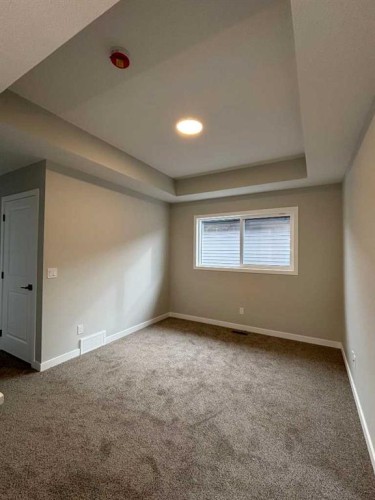 941 Reynolds Lane, Airdrie, AB - Indoor Photo Showing Other Room