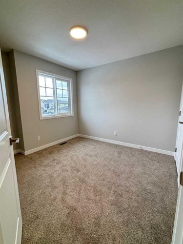 941 Reynolds Lane, Airdrie, AB - Indoor Photo Showing Other Room