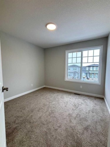 941 Reynolds Lane, Airdrie, AB - Indoor Photo Showing Other Room