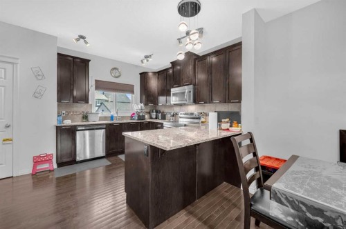 243 Evansborough Way Nw, Calgary, AB - Indoor Photo Showing Kitchen With Upgraded Kitchen