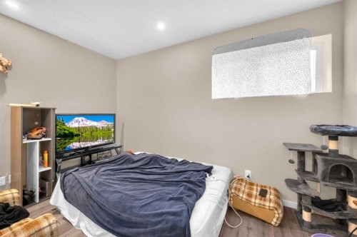243 Evansborough Way Nw, Calgary, AB - Indoor Photo Showing Bedroom