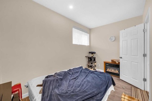 243 Evansborough Way Nw, Calgary, AB - Indoor Photo Showing Bedroom