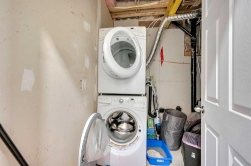 243 Evansborough Way Nw, Calgary, AB - Indoor Photo Showing Laundry Room