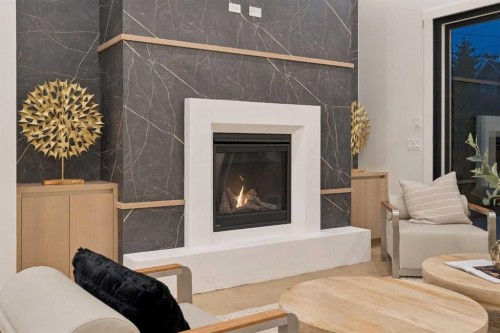 1740 6 Avenue Nw, Calgary, AB - Indoor Photo Showing Living Room With Fireplace