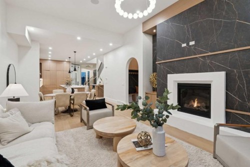 1740 6 Avenue Nw, Calgary, AB - Indoor Photo Showing Living Room With Fireplace