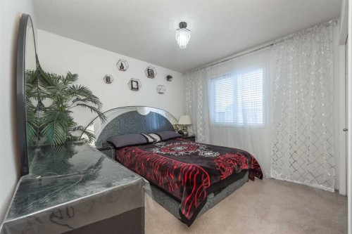 8430 Saddleridge Drive Ne, Calgary, AB - Indoor Photo Showing Bedroom