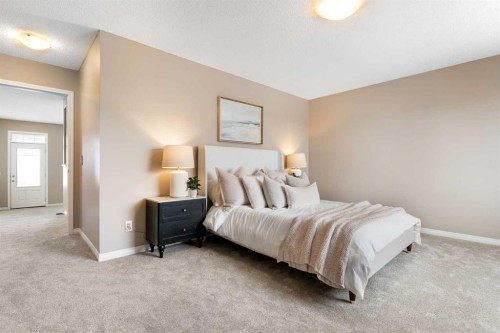 149 Windridge Road Sw, Airdrie, AB - Indoor Photo Showing Bedroom