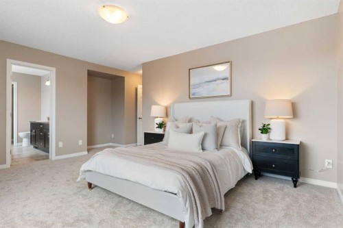 149 Windridge Road Sw, Airdrie, AB - Indoor Photo Showing Bedroom