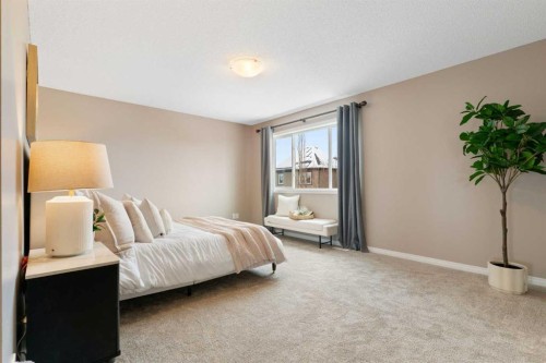 149 Windridge Road Sw, Airdrie, AB - Indoor Photo Showing Bedroom