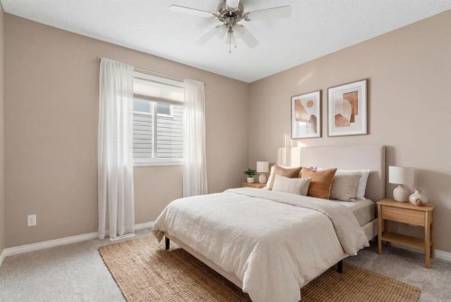 149 Windridge Road Sw, Airdrie, AB - Indoor Photo Showing Bedroom