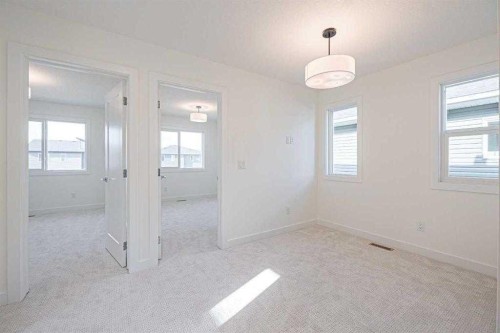 129 Dawson Wharf View, Chestermere, AB - Indoor Photo Showing Other Room