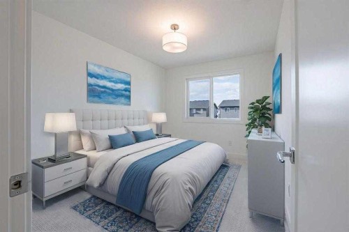 129 Dawson Wharf View, Chestermere, AB - Indoor Photo Showing Bedroom