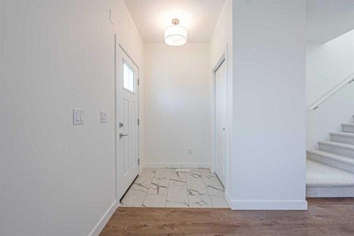 129 Dawson Wharf View, Chestermere, AB - Indoor Photo Showing Other Room